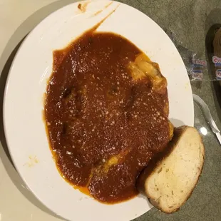 a plate of chili and bread