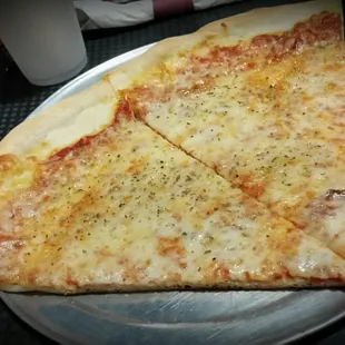 Two slices of cheese and a fountain drink will run you less than $9.