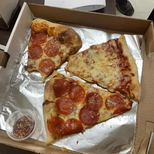 two slices of pepperoni pizza