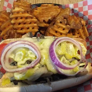 a hot dog with onions and cheese
