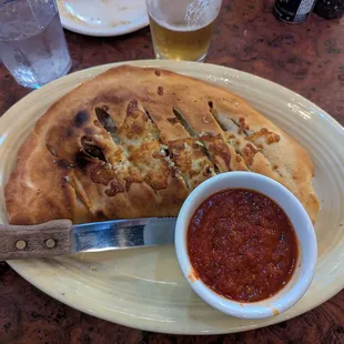 Sausage and pepperoni calzone