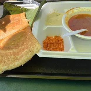 a plate of food and a bowl of soup