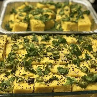 Khaman Dhokla
 Vegan .
 Steamed, delicious savory cakes made of fermented chickpea batter. Served with mint&amp;green apple dip.