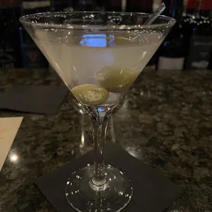Dirty martini with hand stuffed olives.