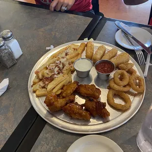 Chicken, French fries, Calamari, and Fried Mozzarella Sticks