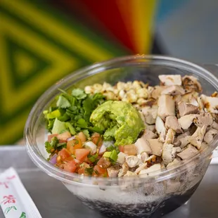 a salad in a plastic container