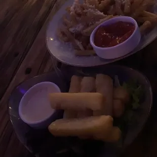 Yucca fries(bottom), French fries (above). French fries tasted better.