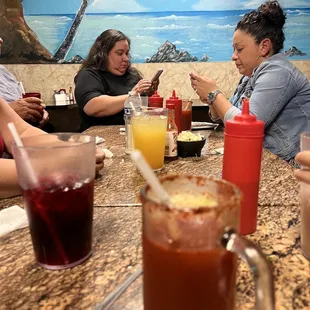 a group of people sitting at a table