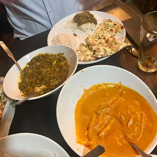 a variety of dishes of food on a table