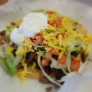 Tostada with beef fajita