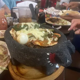 mexican food being served at a restaurant
