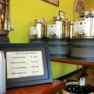 a row of wine barrels on a table