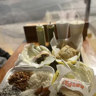 top to bottom, left to right: Beef Shredded Arepa, Beef Shredded Empanada/Pastelito Ground Beef and Rice, Pabellon Plate, Pabellion Arepa