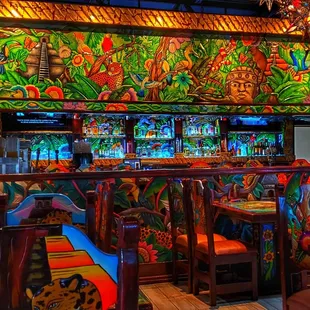a brightly colored bar with a tropical theme