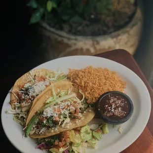 One of our many vegetarian plates, our Peasant Tacos with our vegan rice (upon request) and black beans