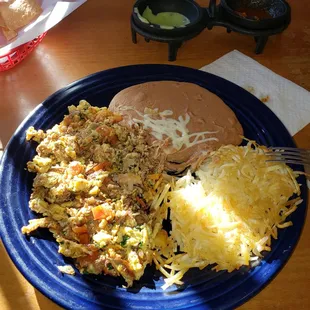 Machaca, refried beans, and hash browns for breakfast.