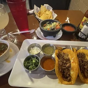 Tacos de birria, guacamole, jumbo margarita, with the free chips and salsa that comes with