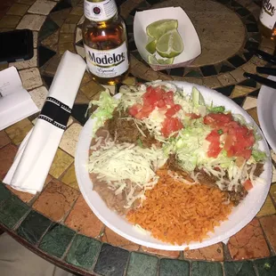 a plate of mexican food on a table
