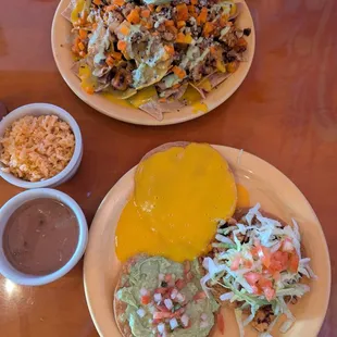 Nachos del Picadillo, Trinidad Plate, and rice and beans on the side.