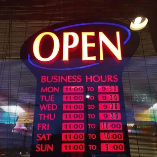 an open business hours sign