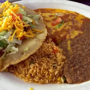 Thursday's lunch special. Two cheese enchiladas, beef taco, with rice and beans. Delicious.