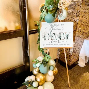 a welcome sign for a baby shower