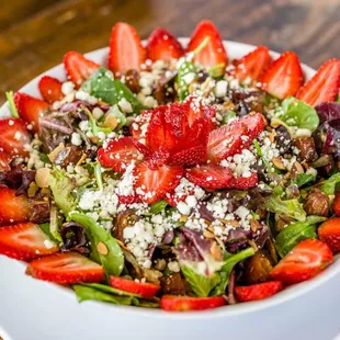 Vivel Salad:
Goat cheese, Fresh strawberries, Organic dates, toasted almonds, Pear Honey mustard vinaigrette.