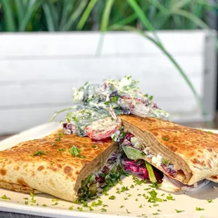 Gyro Beef Crepe:
Roasted tomatoes, sauteed onions, Tzatziki, Feta cheese, Mixed greens.