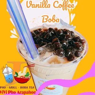 a cup of coffee with a straw