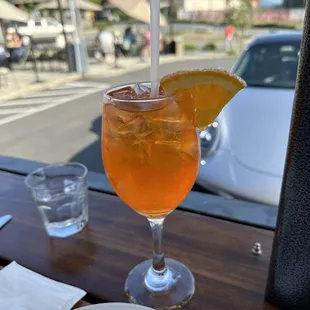 a drink with a slice of orange