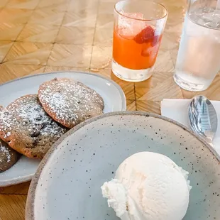 a plate of cookies and a bowl of ice cream