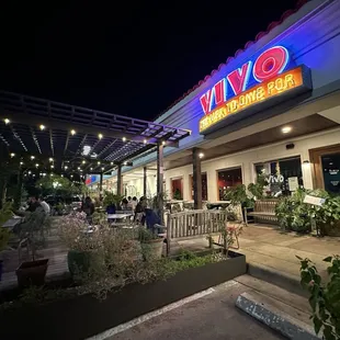 Bright signage and beautiful outdoor patio.