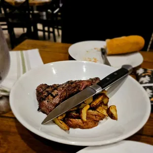 Steak, potatoes, gluten free bread