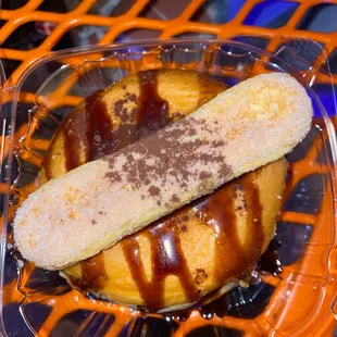 a banana with chocolate on top