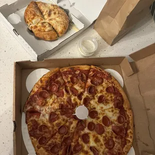 9/12/2024 - Large 1 topping Spicy Pepperoni and cheese pizza. Small Cheese Bread.  Side of ranch (included 2)