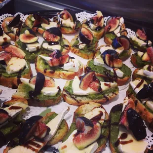 Saint Andre Triple Creme, Fig, and House-Made Pesto Crostini.