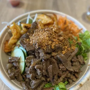 a bowl of beef and vegetables