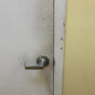Filthy bathroom door.