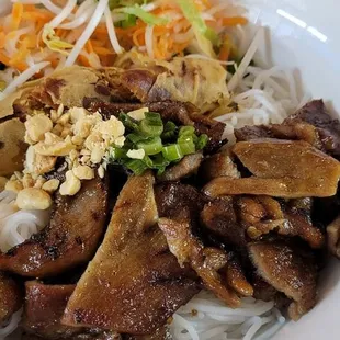 Grilled pork and eggrolls in vermicelli and fish sauce.