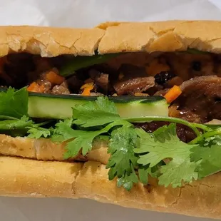 Grilled pork bahn mi with extra meat