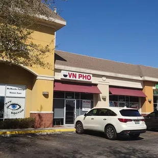 cars parked in front of a store