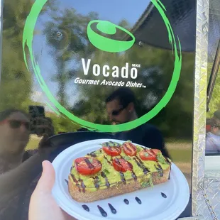 a plate of avocado toast