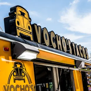 Vocho&apos;s Tacos food truck sign