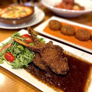 Costolette di Agnello: Breaded lamb chops, roasted fig puree, baby arugula and pomodorini.