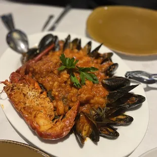 Pasta with Lobster, muscles and shrimp. It was my husbands, not sure of official name.