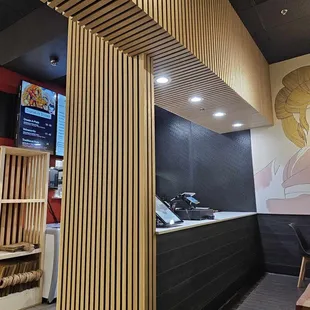 front counter with amazing wall art.