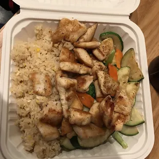 Chic, zucchini, broccoli and carrots hibachi with fried rice'