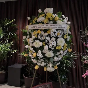 Funeral wreath created by Pat of Volcano Orchids/ The Funeral Wreath Shop.
