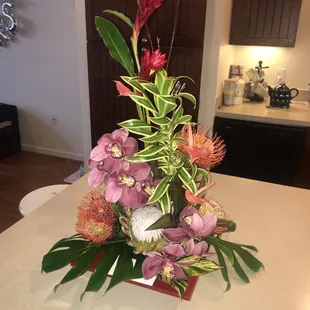 Hand crafted arrangement of lovely Hawaiian flowers.