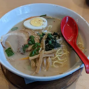 Tonkotsu Ramen, White creamy shoyu broth, pork belly, scallion, corn, bean sprouts, bamboo shoots, with marinated soft egg.